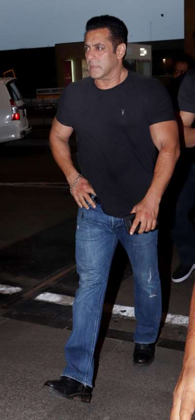 Salman Khan swears by a black t-shirt and blue denim in his recent airport look