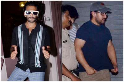 Bollywood stars Aamir Khan and Ranveer Singh get clicked in the city by paparazzi.