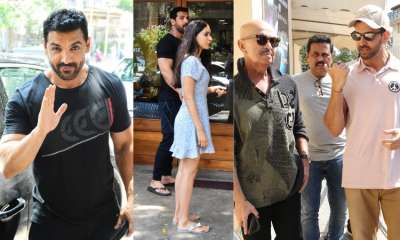 Two handsome hunk of Bollywood-Hrithik Roshan and John Abraham were spotted today with their family on Sunday outing. Check out pictures below.