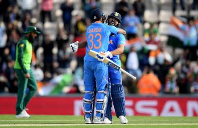 Rohit Sharma curbed his natural flair for greater good as his gritty hundred complemented a superb bowling effort in India's resounding six-wicket victory over a hapless South Africa in their World Cup opener on Wednesday.