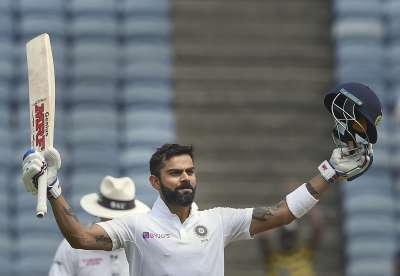 Virat Kohli blended grace with determination to raise his record-breaking seventh double hundred which grinded down a hapless South Africa on the second day of the 2nd Test on Friday.