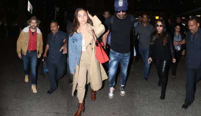 New Year vacations are over and Bollywood celebrities are back to work. Alia, Ranbir, Varun and Natasha were papped at the airport as they returned to Mumbai last night.