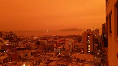 California turned orange with an ominous glow as more than 25 wildfires burn across the state. The pictures have left Twitterati shocked.
