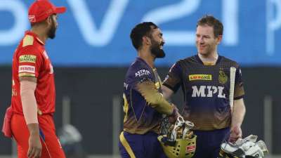 KKR captain Eoin Morgan (far right), played a match-winning knock of 47, with vice captain Dinesh Karthik after winning the match against Punjab Kings in Ahmedabad on April 26, 2021 (Tuesday).