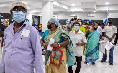 Kolkata: Beneficiaries wait for their turn to receive a dose of COVID-19 vaccine during Free Mega Vaccination Camp, in Kolkata,Wednesday, June 16, 2021.