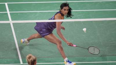 Reigning world champion P V Sindhu sailed into the women's singles quarterfinals with a straight-game triumph over Denmark's Mia Blichfeldt in the Olympics badminton competition. The 26-year-old Indian, who won a silver in the 2016 Rio Olympics, notched up a 21-15 21-13 win over 13th seed Blichfeldt in a 41-minute match.