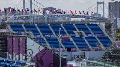 Tokyo's Rainbow Bridge stands in the distance behind Ariake Urban Sports Park on Thursday as they prepare the arena for opening ceremony.