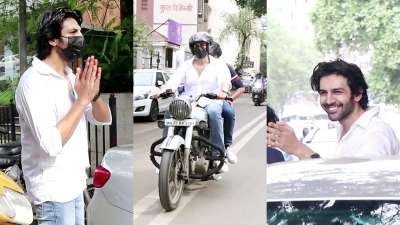 Bollywood actor Kartik Aaryan was spotted on Mumbai streets riding his bike in style. He greeted the paparazzi and also happily posed for the cameras.
