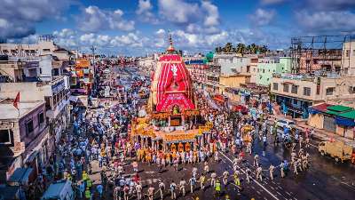 Devotees perform rituals during the annual Rath Yatra festival in Puri.
