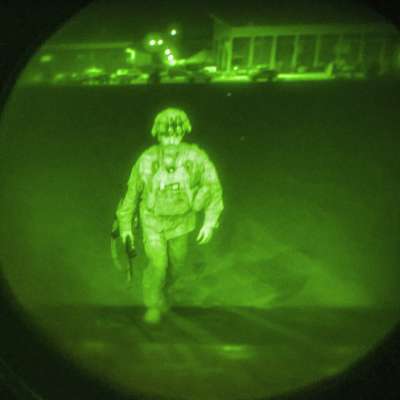 In this image made through a night vision scope and provided by U.S. Central Command, Maj. Gen. Chris Donahue, commander of the U.S. Army 82nd Airborne Division, XVIII Airborne Corps, boards a C-17 cargo plane at the Hamid Karzai International Airport in Kabul, Afghanistan
&amp;nbsp;