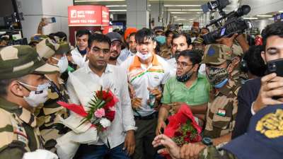 India's triumphant Olympic contingent, including golden boy Neeraj Chopra, returned home to a rousing welcome on Monday. Neeraj won a historic gold in javelin throw after hurling the nordic javelin to 87.58m to become independent India's first gold medallist in track and field and second overall after Abhinav Bindra in 2008 Beijing Games.&amp;nbsp;