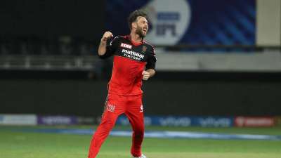 Glenn Maxwell justified his million dollar contract with an all-round performance before Harshal Patel took a hat-trick to ensure a thumping 54-run victory for Royal Challengers Bangalore over Mumbai Indians in the Indian Premier League here on Sunday.