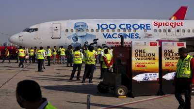 SpiceJet unveils a special aircraft livery to mark 1 billion doses of COVID-19 vaccine milestone in New Delhi.