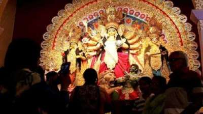 Image of Goddess Durga idol at decorated Durga Puja pandal, shot at colored  light, in Kolkata, West Bengal, India. Durga Puja is biggest religious  festival of Hinduism and is now celebrated worldwide.-AY108756-Picxy