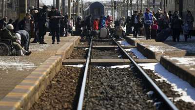 Refugees fleeing the war from neighboring Ukraine switch platforms at the Suceava railway station, in Suceava, Romania.&amp;nbsp;