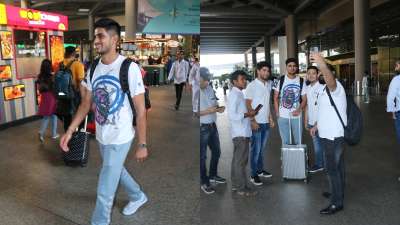 Shubman Gill was sighted at the airport, and the cricketer was all smiles. He was swarmed by fans and happily posed for photos with them.