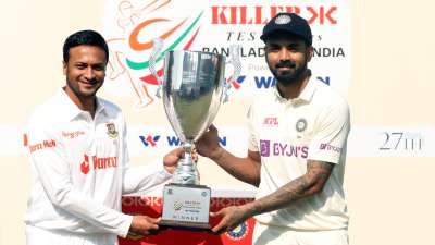 KL Rahul and Shakib-al-Hasan pose with the Test trophy ahead of the 1st Test match of the two-match series, starting December 14. 