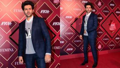 Kartik Aaryan graced the event in a formal blue-block checked suit.