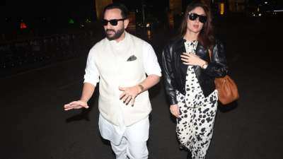Kareena Kapoor Khan and Saif Ali Khan were spotted at the Mumbai airport on Friday. Dressed in white and black, the duo redefined perfection yet again.