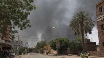 Smoke is seen rising from Khartoum's skyline, Sudan, Sunday, April 16, 2023. 