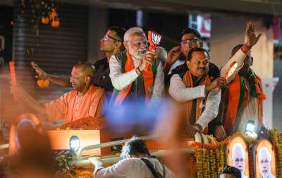 PM Modi and UP CM Yogi Adityanath during a massive roadshow in Kanpur ahead of the Lok Sabha elections.