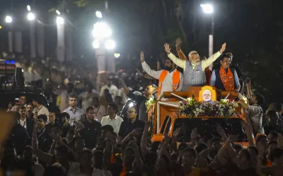 Prime Minister Narendra Modi, Maharashtra Chief Minister Eknath Shinde and Deputy Chief Minister Devendra Fadnavis with others during an election roadshow for the Lok Sabha polls, in Mumbai.