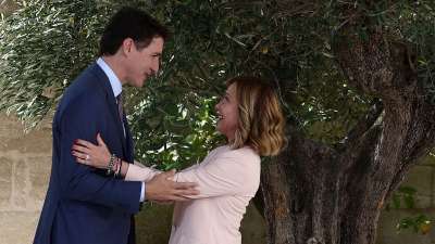 Canadian Prime Minister Justin Trudeau is welcomed by Italy's Prime Minister Giorgia Meloni.