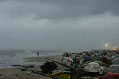 Fishing boats are seen packed at the Marina beach amid strong winds, in Chennai, Saturday.  Hospitals and houses were inundated in Chennai and its neighbourhoods on Saturday following a Cyclone Fengal-induced heavy downpour, as civic authorities said clearing works were on in a war footing.