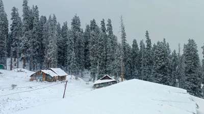 Pockets of Kashmir faced extreme cold temperatures, with Srinagar recording the season&rsquo;s coldest night at -5.4 degrees Celsius. The valley turned white as snow blanketed parts of Kashmir. The picture is taken during snowfall at Tangmarg of Baramulla district of north Kashmir. 