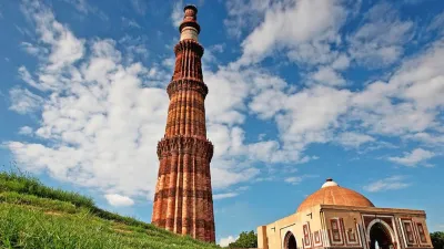 Qutub Minar, a UNESCO World Heritage Site that stands tall as a symbol of Delhi's history. Built in red and buff standstone, it is the highest tower in India. It has a diameter of 14.32 m at the base and about 2.75 m on the top with a height of 72.5 m.