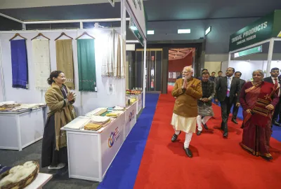 Prime Minister Narendra Modi visits stalls during the inauguration of the Grameen Bharat Mahotsav 2025