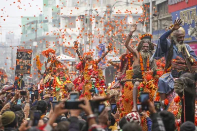 Sadhus of Shri Panchayati Akhara Bada Udasin take part in a procession towards Sangam ahead of Maha Kumbh Mela 2025 in Prayagraj on Sunday