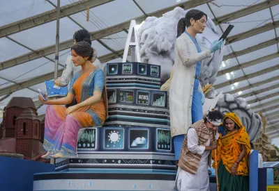 A tableau of the India Meteorological Department (IMD), which will participate for the first time in the Republic Day Parade, on display during a press preview of tableaux, at Rashtriya Rangshala Camp in New Delhi