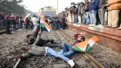 Students block railway tracks as they protest demanding the cancellation of the 70th Integrated Combined Competitive (Preliminary) Examination (CCE), 2024, conducted by the BPSC, over allegations of question paper leak, at Sachiwalay Halt railway station, in Patna.