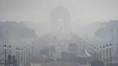 Fog engulfs India Gate, Kartavya Path during a cold winter morning in New Delhi. 