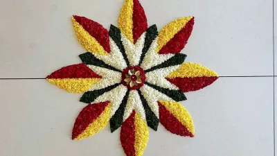 Pookalam is a vibrant floral carpet created on the ground as part of the Onam festival celebrations in Kerala. Derived from the words &#039;poov&#039; (flower) and &#039;kalam&#039; (art), Pookalam is a traditional art form that combines colours, symmetry, and creativity to welcome King Mahabali during Onam. 