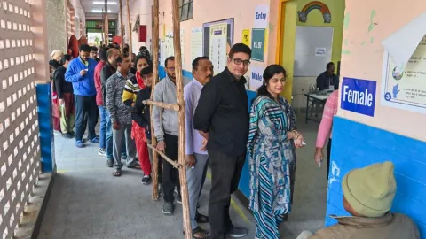 Voters outside a poll booth in Delhi/ Photo used for