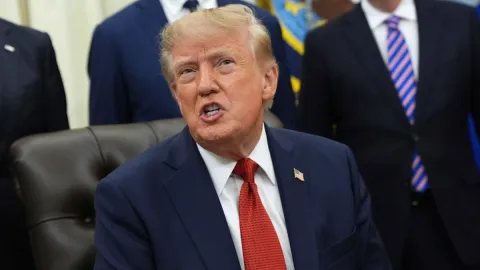 US President Donald Trump speaks to reporters at White