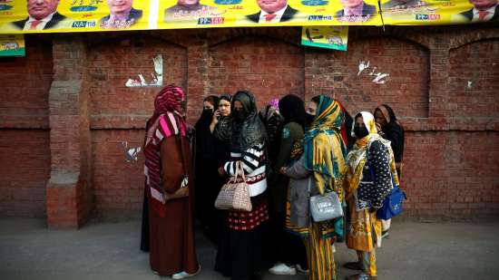 India Tv - PAk: voters gather at a polling station in Pakist
