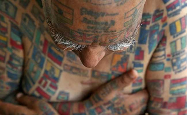 74 Year Old Got 500 Tattoos Teeth Removed To Enter Guinness Book Mouthful News India Tv