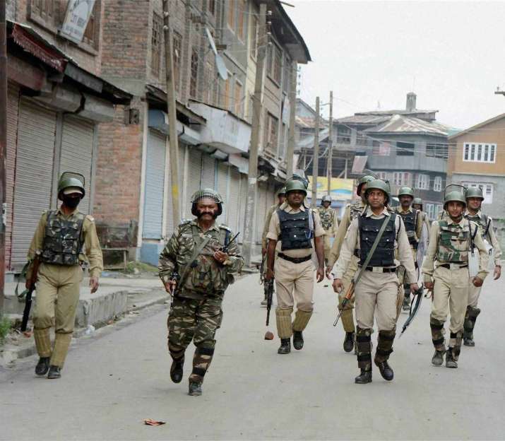 Security personnel during vigil in Kashmir