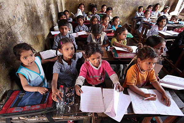 India late by half a century in achieving education goals: