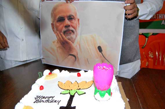 PATNA, INDIA - JANUARY 5: BJP MP Sushil Kumar Modi cutting the cake to  celebrating his 71st