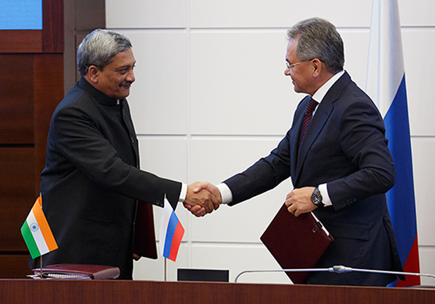 File pic - Sergei Shoigu and Manohar Parrikar shakes hand.