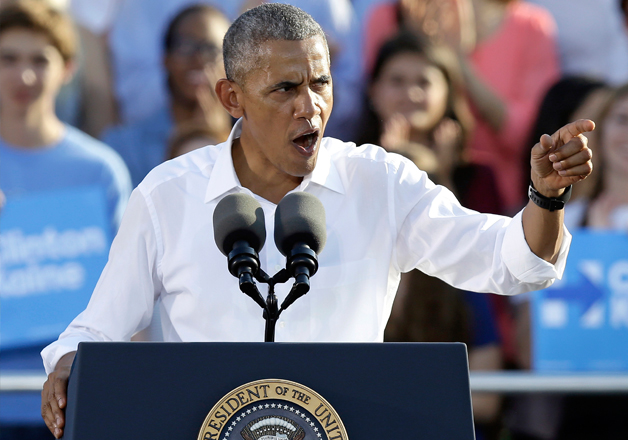 Barack Obama speaks to supporters while campaigning in