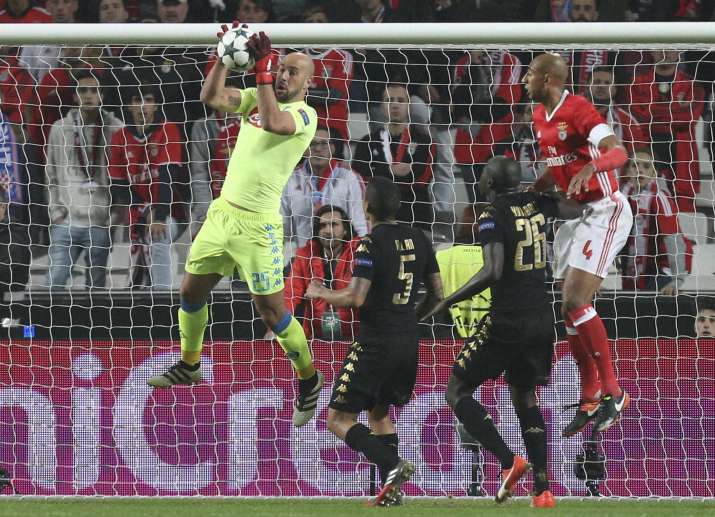 Former Liverpool goalkeeper Pepe Reina in action, holding