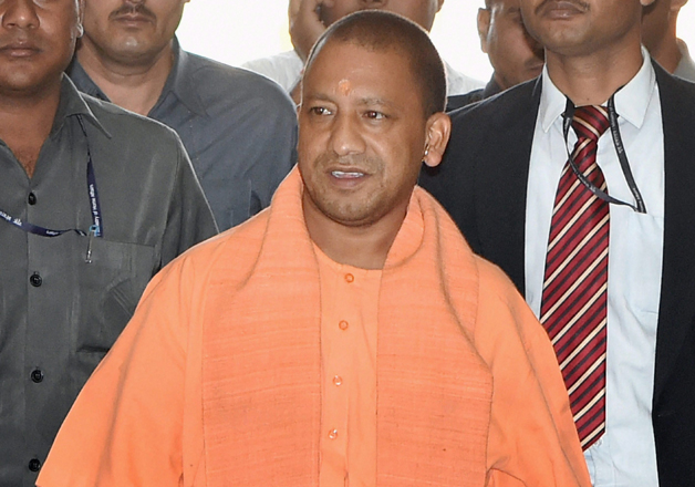 CM Adityanath arrives for a meeting with police officers at