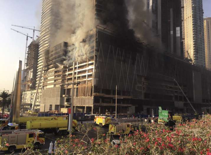 Smoke fills Dubai sky as large fire erupts at high-rise complex near ...