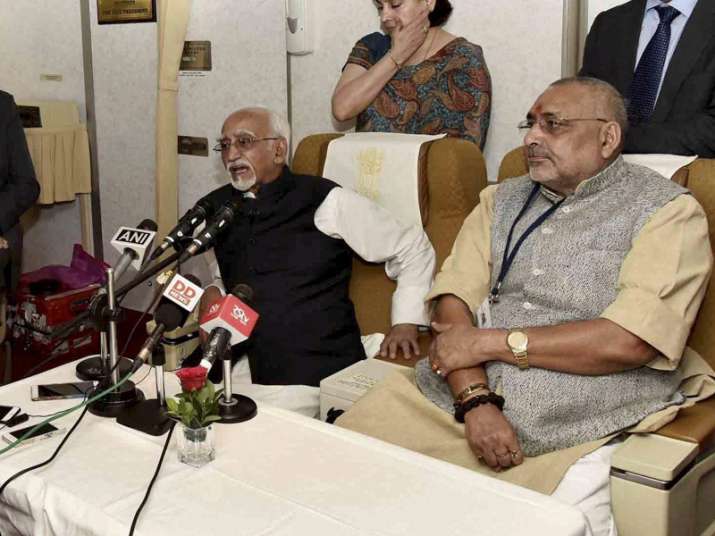 Hamid Ansari, Giriraj Singh addressing media onboard AI One