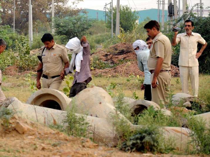 Rohtak: Police, with the accused, inspecting the scene of